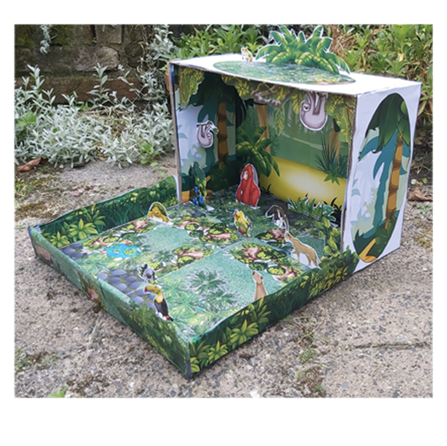 Printable tropical rainforest background page for a children's shoebox ecology project